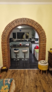 Photo of room dividing arch entrance lined with Spainsh solid thin bricks