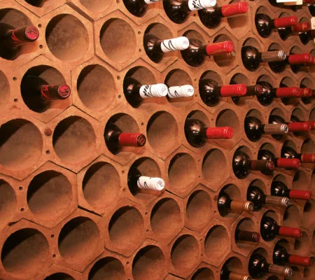 photo of a wine rack of 2 hole terracotta hexagons