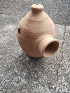 Photo of terracotta bird nest