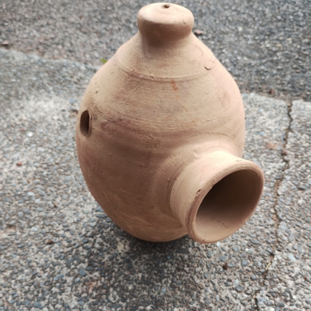 Photo of terracotta bird nest