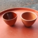 Photo of glazed and unglazed small Spanish cups