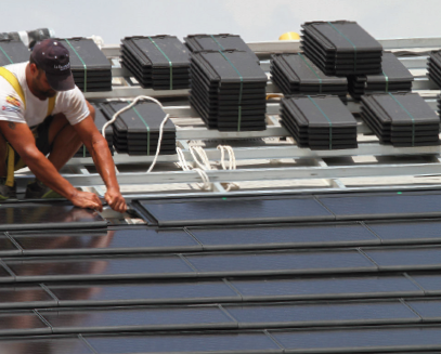 Fitting solar PV tiles