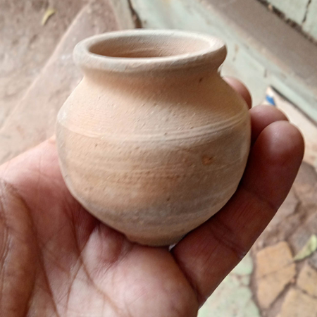 Photo of miniature Indian cooking pot