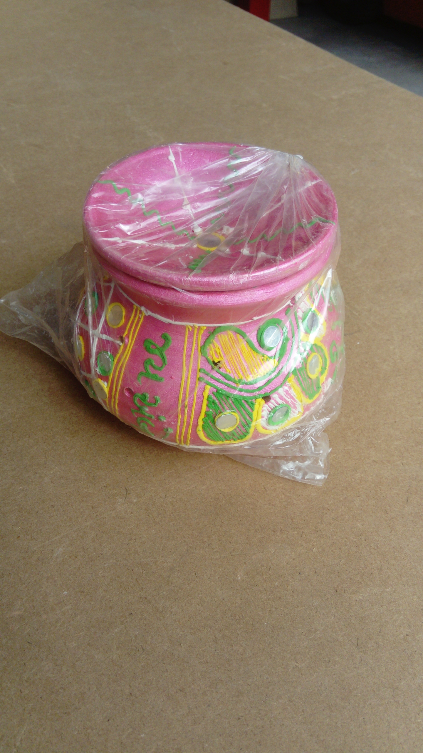 Photo of painted and decorated Indian Garba pot