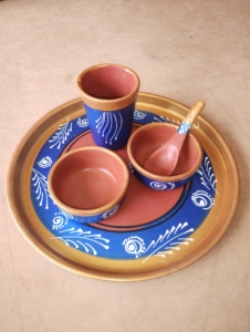 Indian clay decorated dinner service